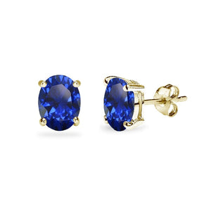 Yellow Gold Flashed Sterling Silver Created Blue Sapphire 7x5mm Oval-Cut Solitaire Stud Earrings - Presidential Brand (R)