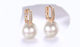 Micro-Pav'e Swarovski Crystal Curved Pearl Huggie Earrings Set in 18K Gold - Presidential Brand (R)