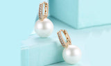 Micro-Pav'e Swarovski Crystal Curved Pearl Huggie Earrings Set in 18K Gold - Presidential Brand (R)